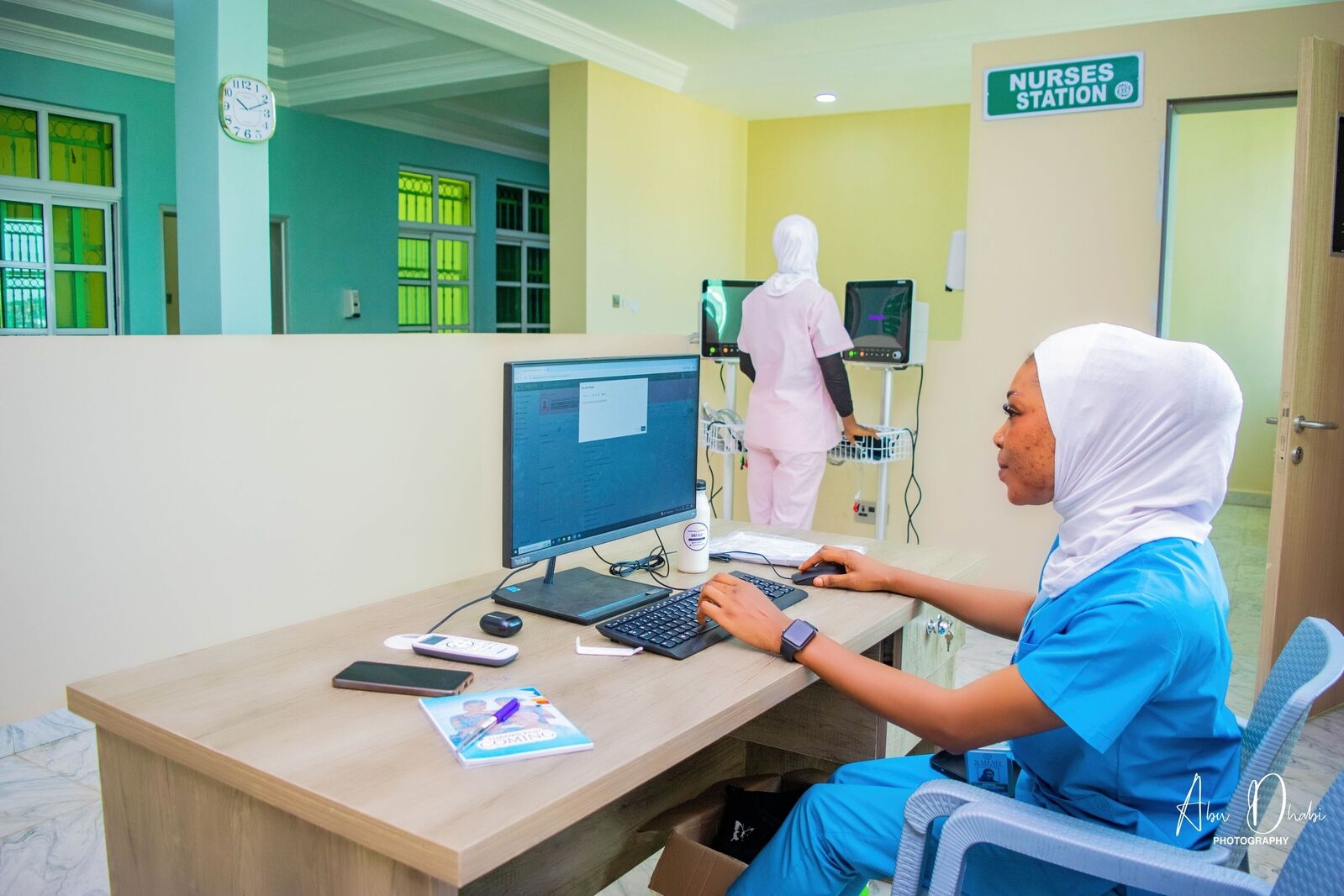 Doctor accessing real-time patient data with CynoxHealth EHR system at Sahad Hospital Abuja for improved healthcare workflow
