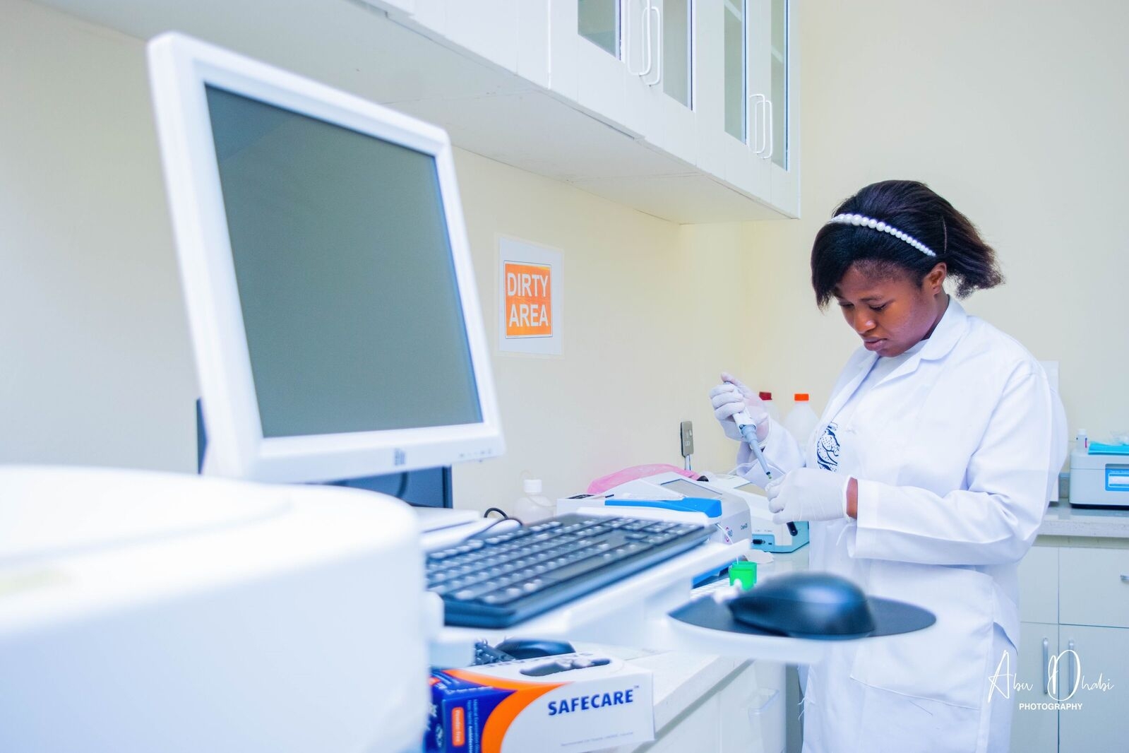 Laboratory technician conducting medical test with results to be securely integrated into CynoxHealth EHR system