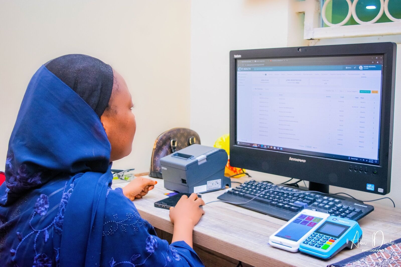 Healthcare staff using CynoxHealth EHR software at Sahad Hospital Abuja to manage patient records securely